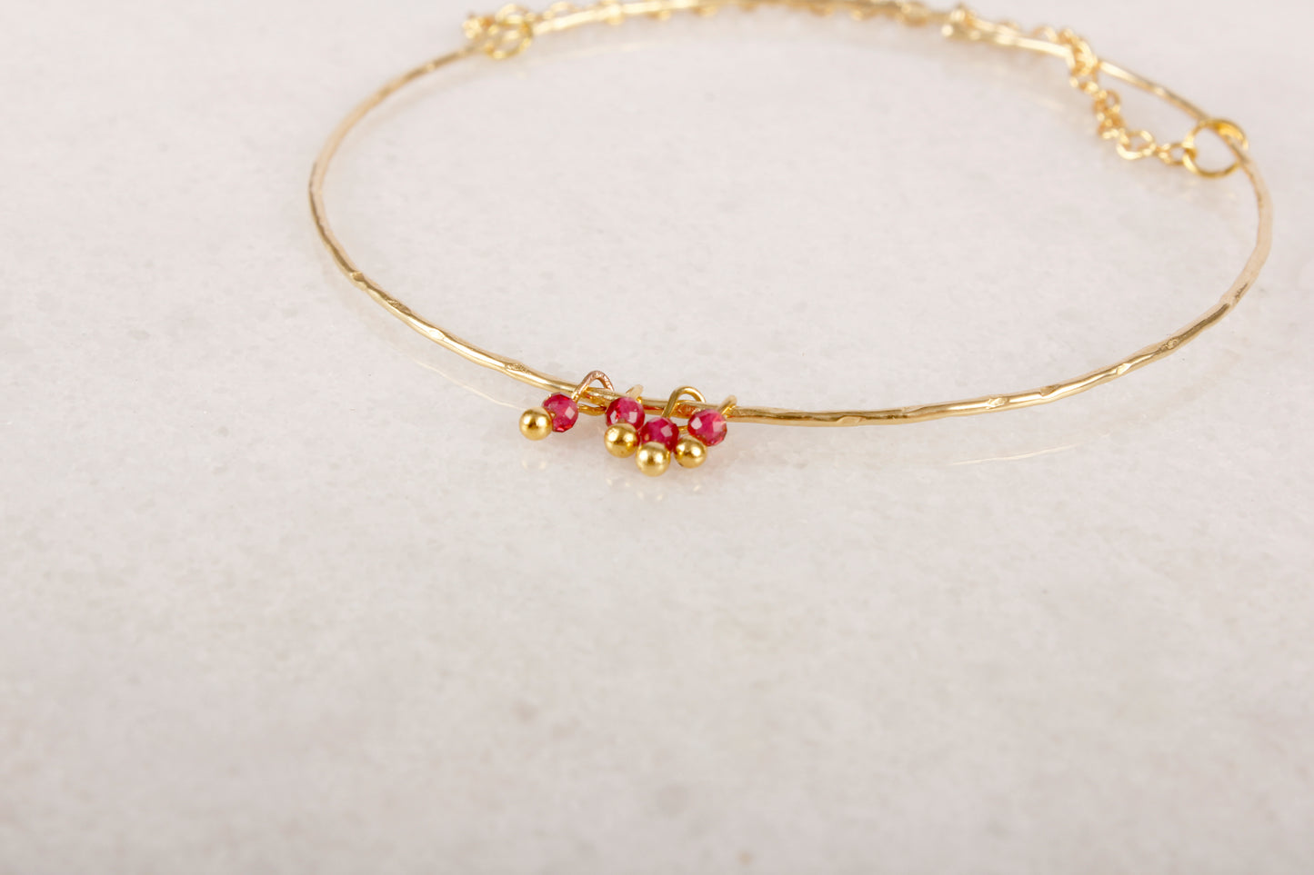 Razzle Dazzle Ruby Brass Bangle